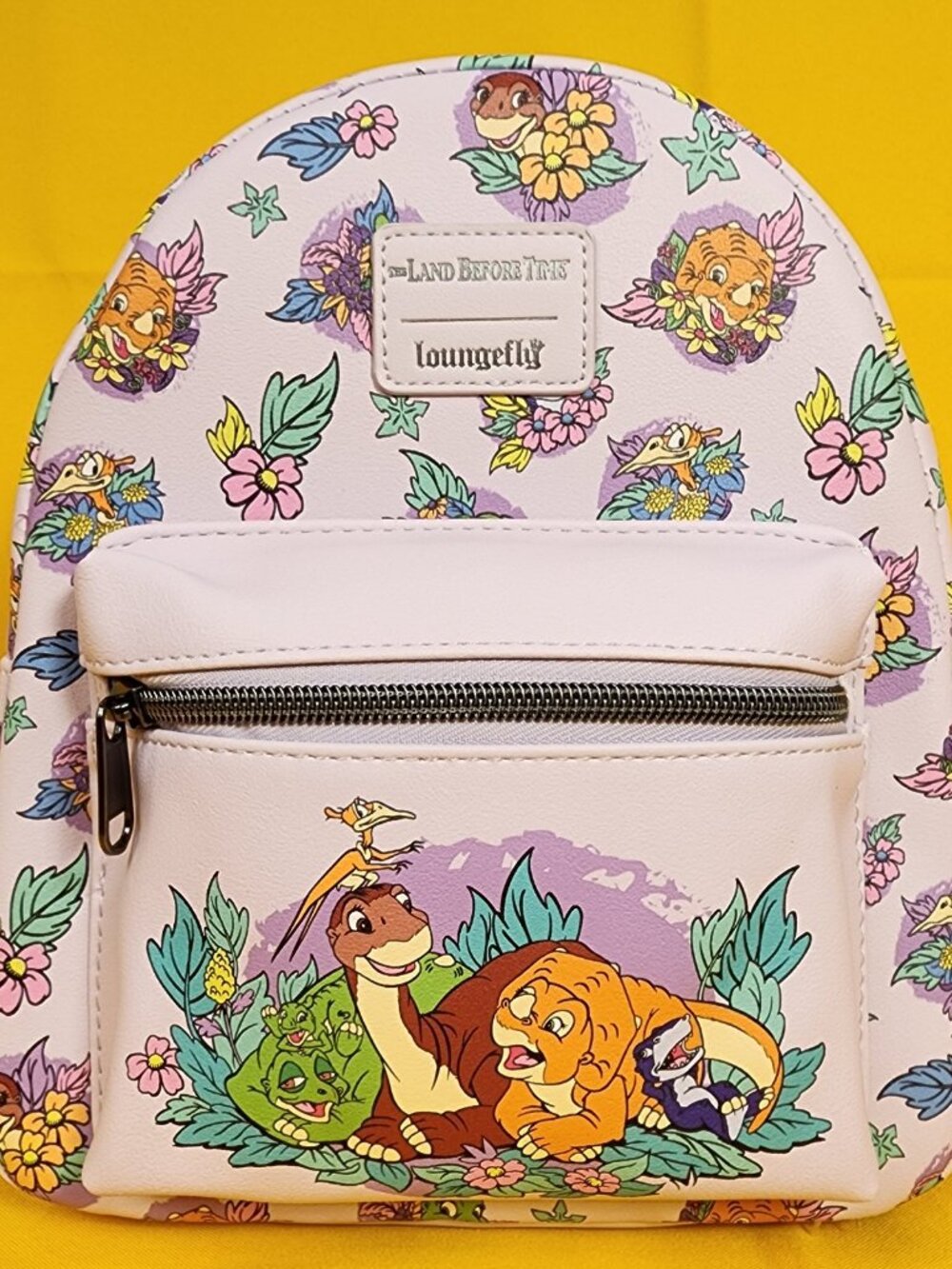 Loungefly The Land Before Time Dinosaurs Floral Purple Soft Tag Mini Backpack - Picture 2 of 11